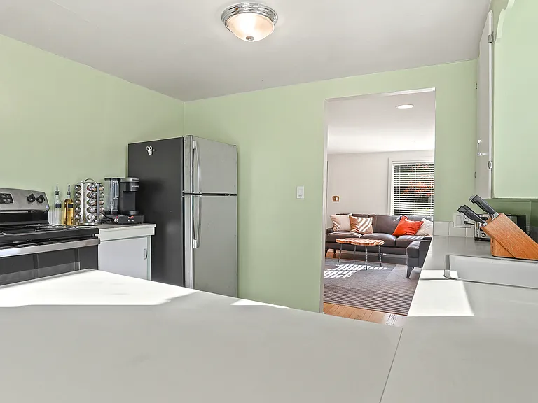 Kitchen looking into living room.