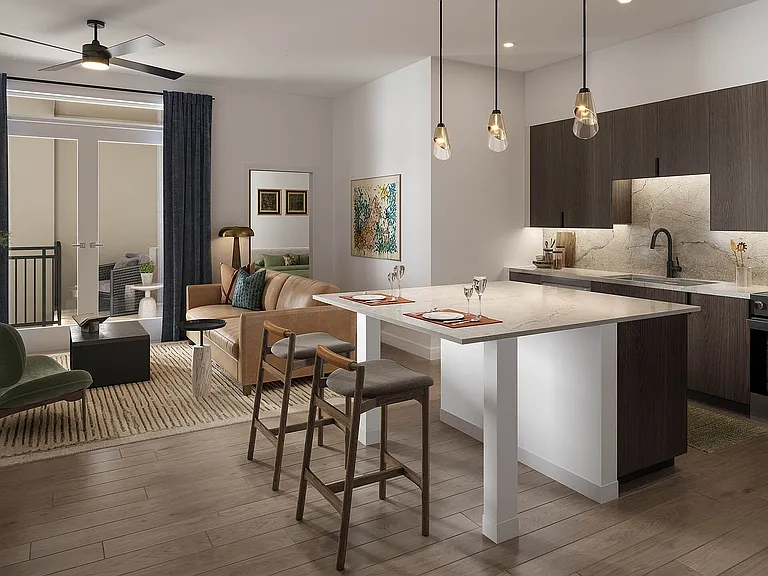 Large apartment kitchens and islands with full tile backsplashes & hardwood flooring