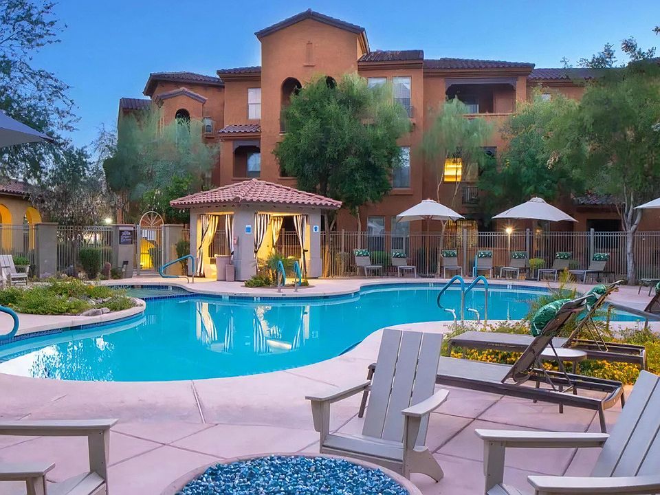 Relaxing Pool Deck with Lounge Chairs and Evening Ambiance