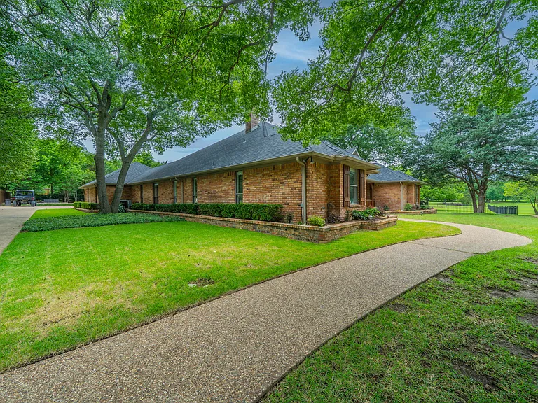 Elegant Brick Estate with Massive Lawn & Professional Landscaping
