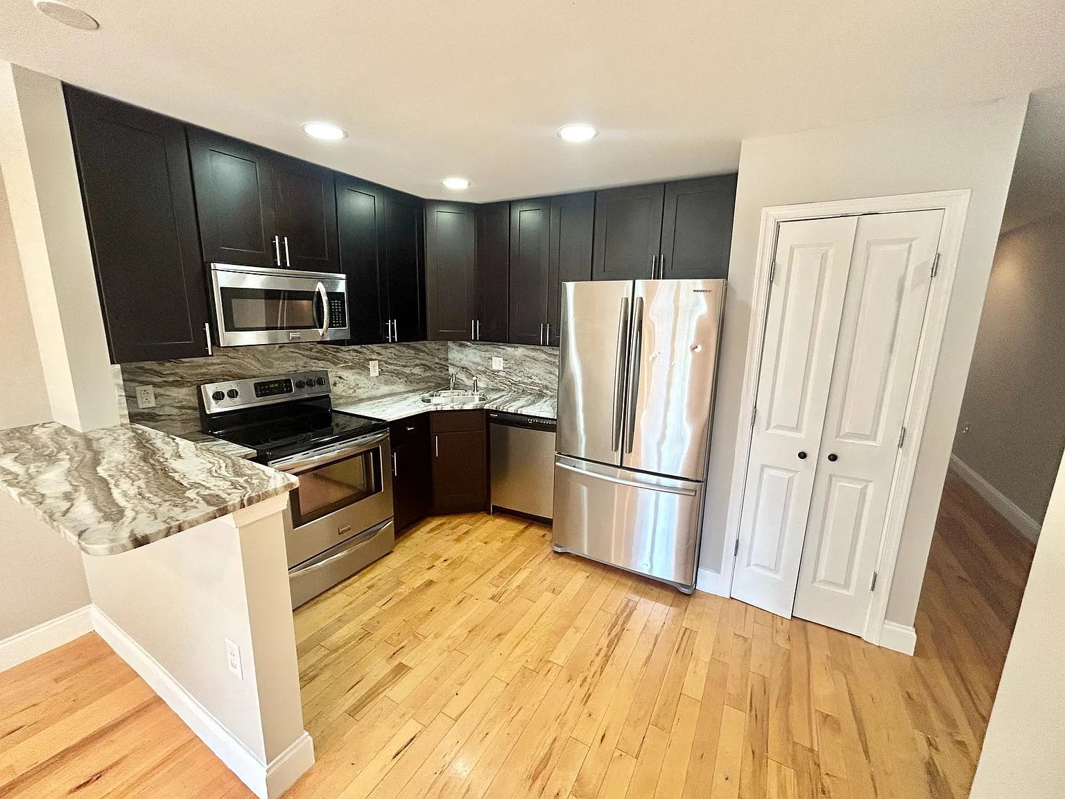Spacious 3-Bedroom, 2-Bath Apartment with Finished Basement, Private Patio, and In-Unit Laundry — Photo 2