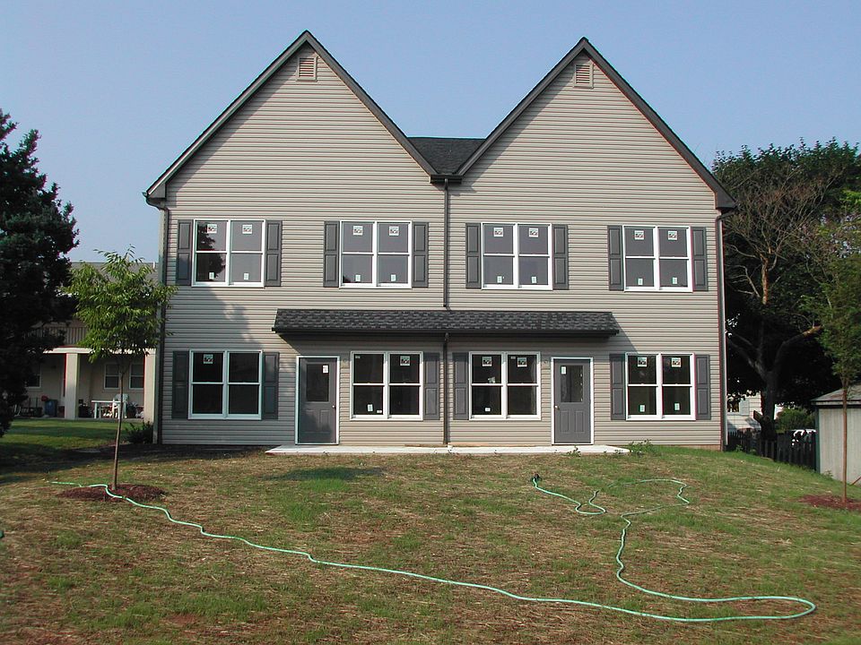 Shows private Patio on the left fpr Unit D enjoyment 
Large yard is shared by all tenants
