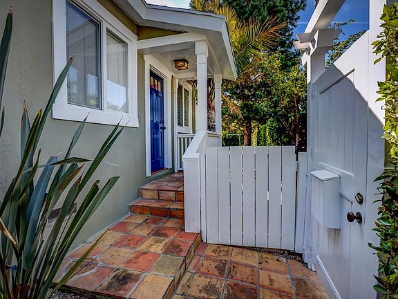 Gated entry to house.