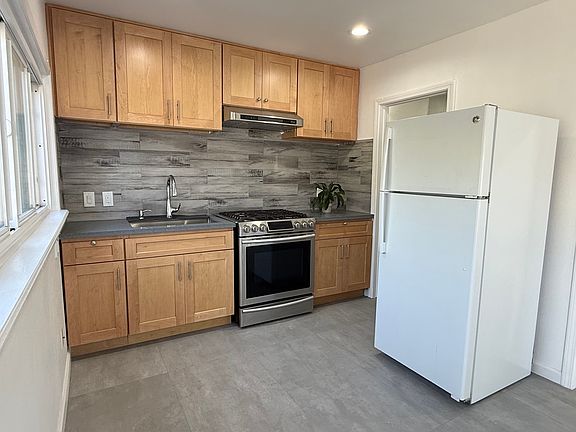 Brand new fully remodeled kitchen with refrigerator and gas oven included!