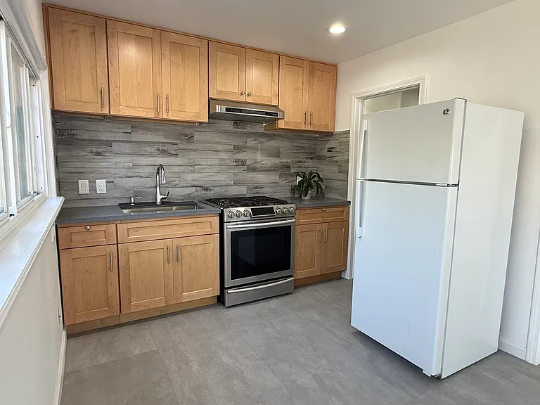 Brand new fully remodeled kitchen with refrigerator and gas oven included!