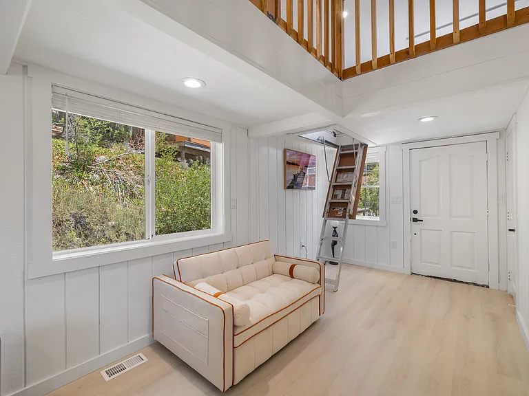 Third bedroom off Second can be closed off by sliding glass door. Additional sleeping loft is above