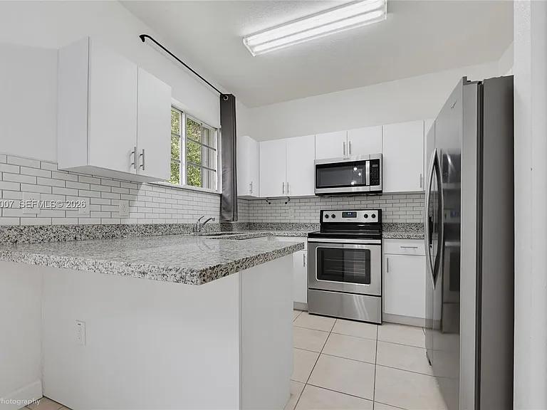 2630 NE 3rd Dr — Photo 13