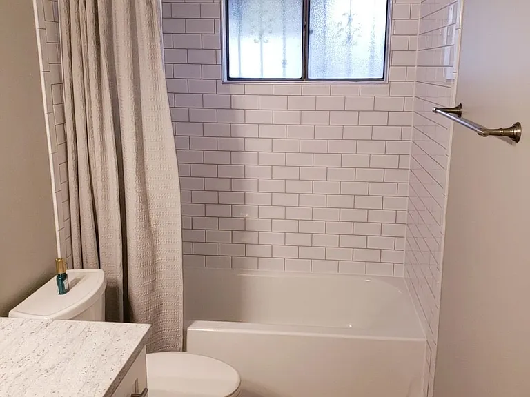 remodeled bathroom with timeless subway tile.