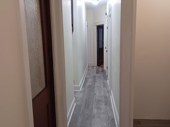 Hallway to kitchen and bathroom