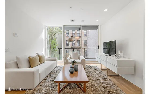 Sold by Douglas Elliman | media 13