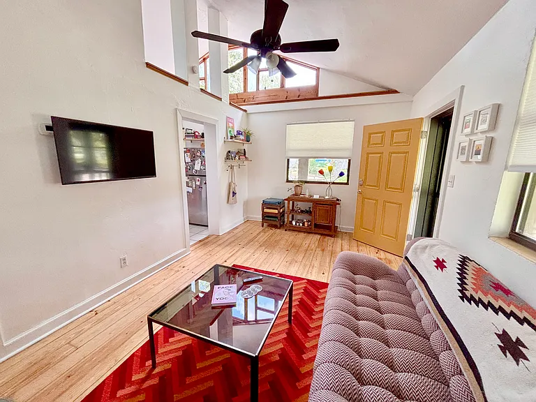 Living space with unique vaulted ceiling feature