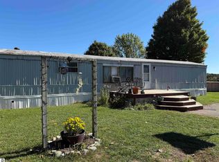 5793 W Blair Townhall Rd, Grawn, MI 49637