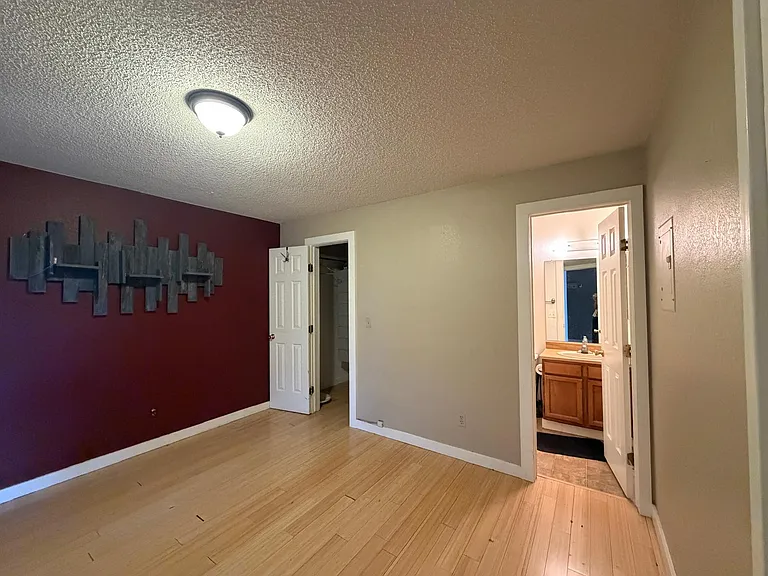 Primary Bedroom with walk in closet and bathroom.