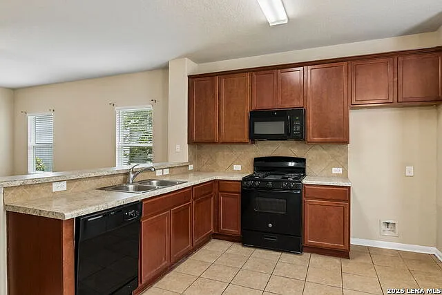 9922 Belmore Cv — Photo 12