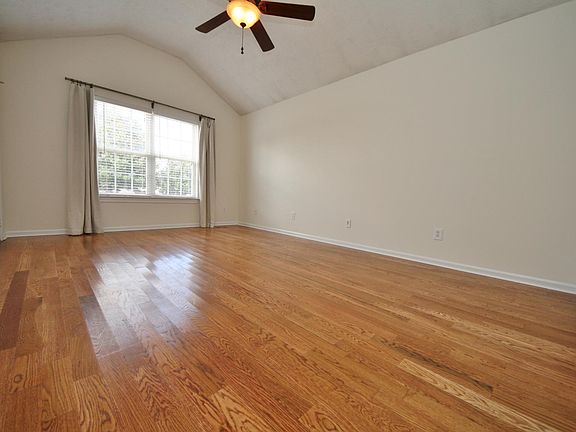 Vaulted ceilings in living room.