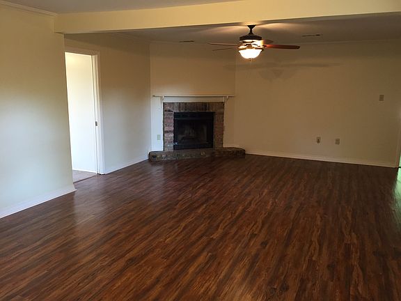 Den showing Fireplace