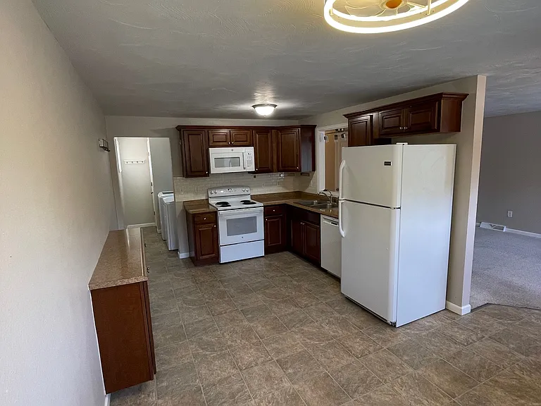 Plenty of space in kitchen for family meals.