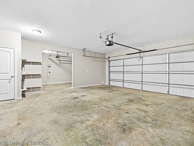 Large 3 car garage with storage