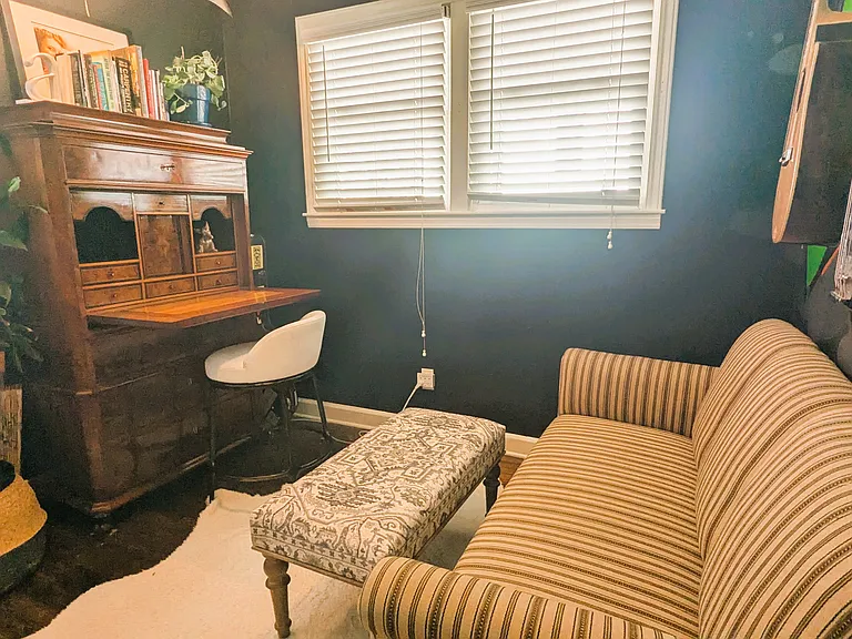 Bedroom 4 is set up as an office