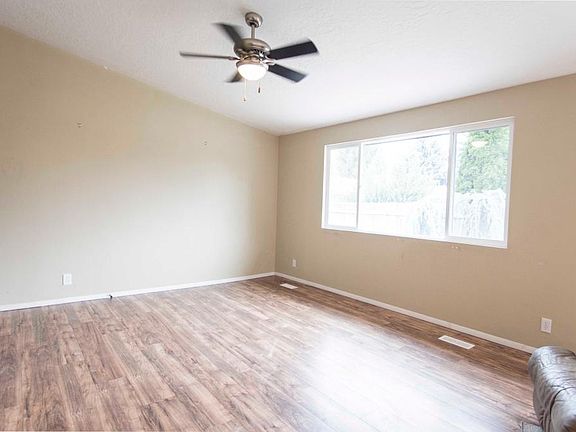 Vaulted ceilings and large windows in living space