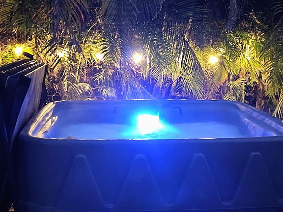 Hot tub seats 4, open year round.