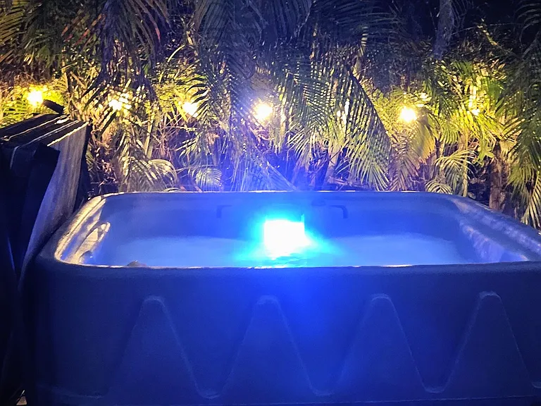 Hot tub seats 4, open year round.