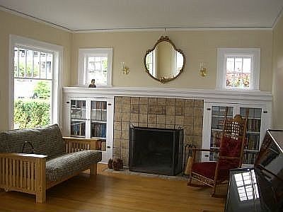 Batchelder tile fireplace tile with leaded glass bookcases