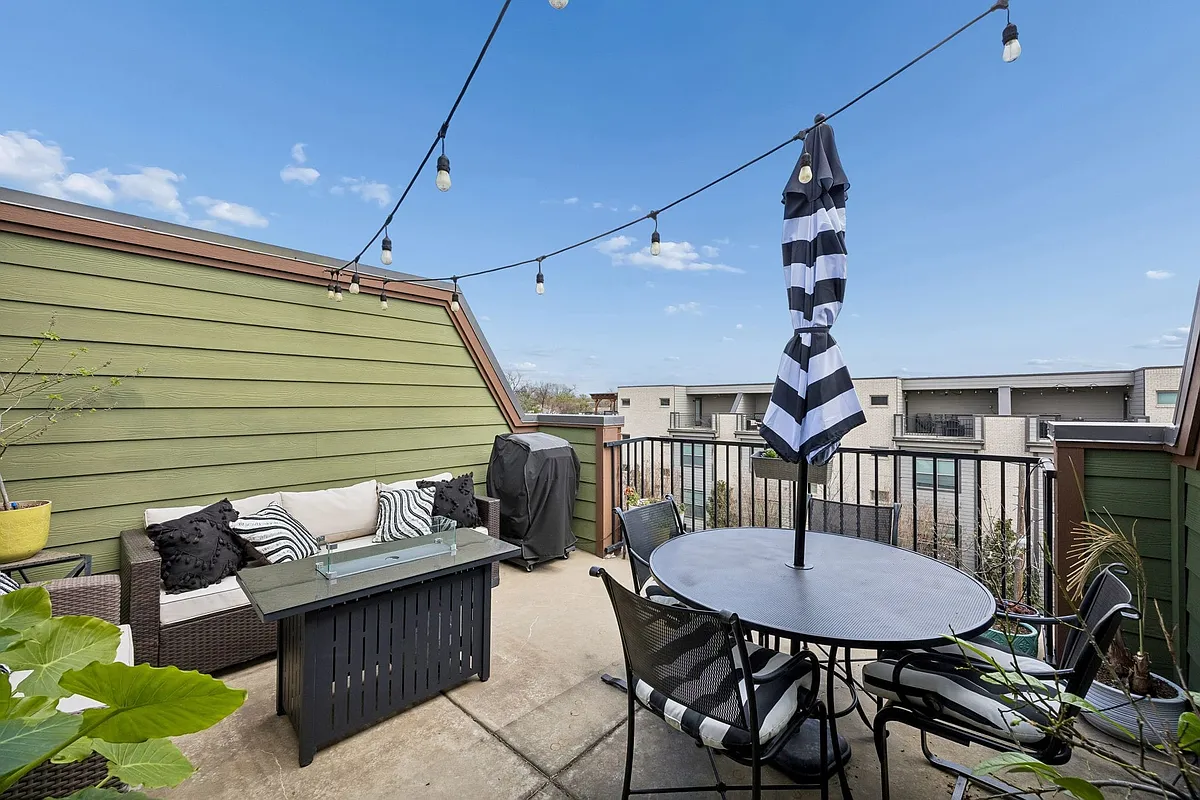 Rooftop patio featuring grilling area and an outdoor living / dining area - 5875 Ross Ave #9