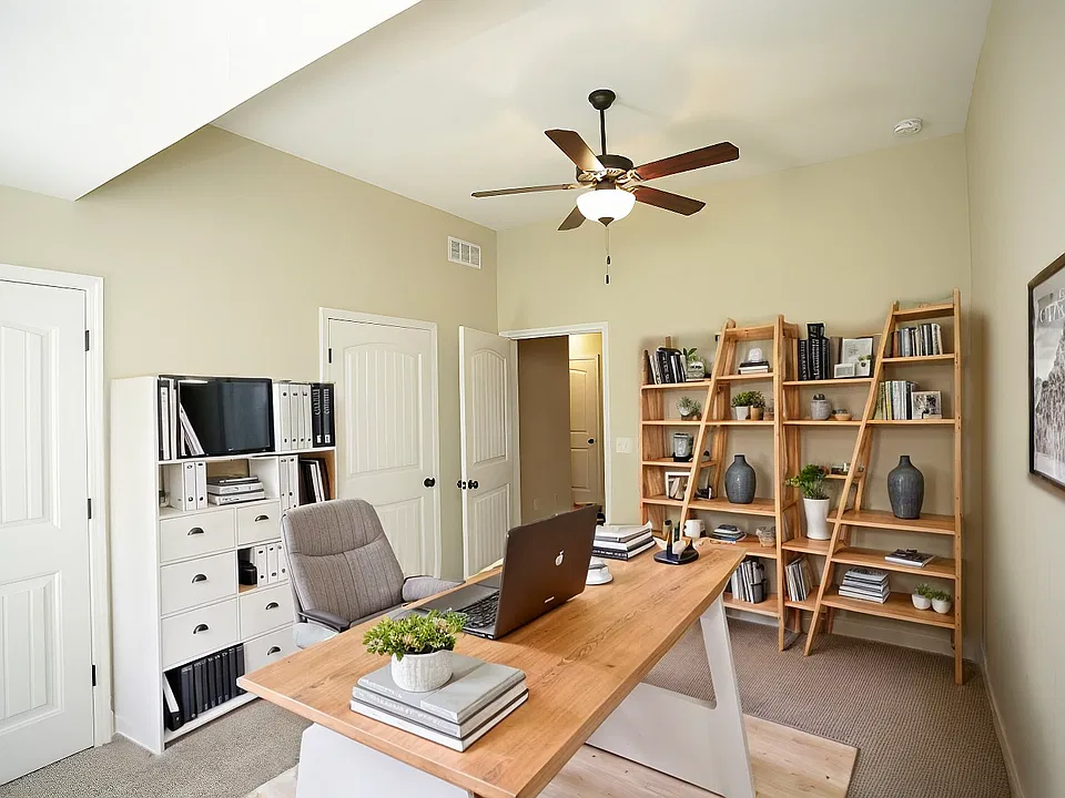 3rd bedroom on 1st floor. Can be used for an office, bedroom, kids playroom, and more.