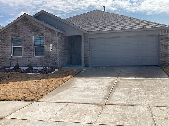 Long Driveway Will Easily Accomodate 2 Vehicles.