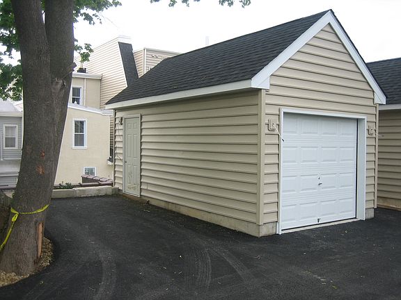 Garage Plus 1 Car Parking Pad
