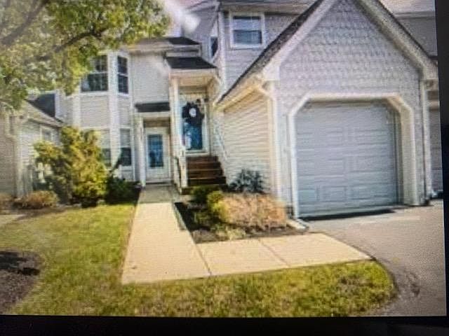 can access apartment thru attached garage downstairs unit