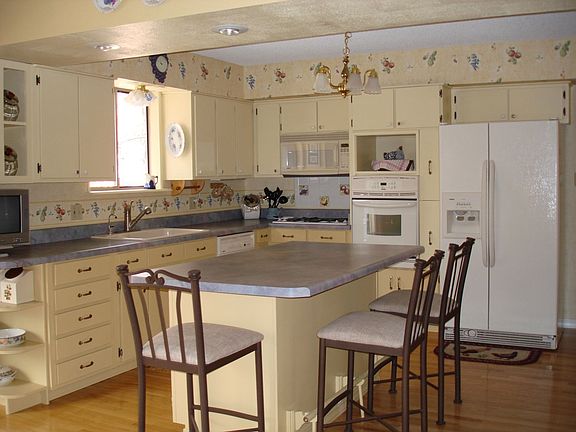Country kitchen with updated appliances
