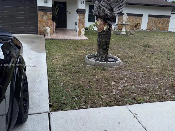 126 Sunflower Cir, Royal Palm Beach, FL 33411