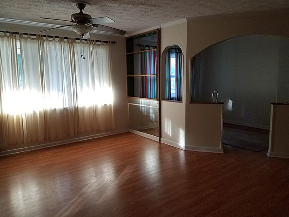 Hardwood floors with upstairs office or dining room area
