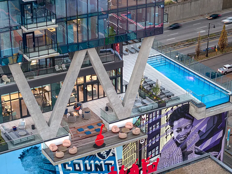 The Outdoor amenity deck at Three Light Luxury Apartments