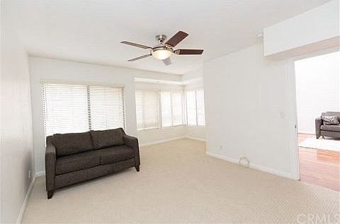 Large, primary bedroom with corner office nook or reading area. Plenty of natural light