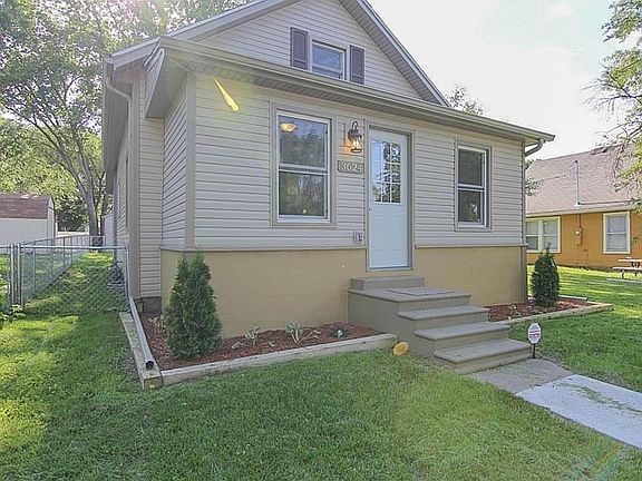 Front Enclosed Porch Showing New Vinyl Siding