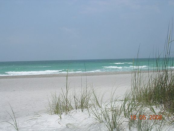 2 min walk from beautiful private beach!