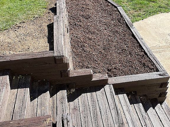 Built in flower/garden bed. 