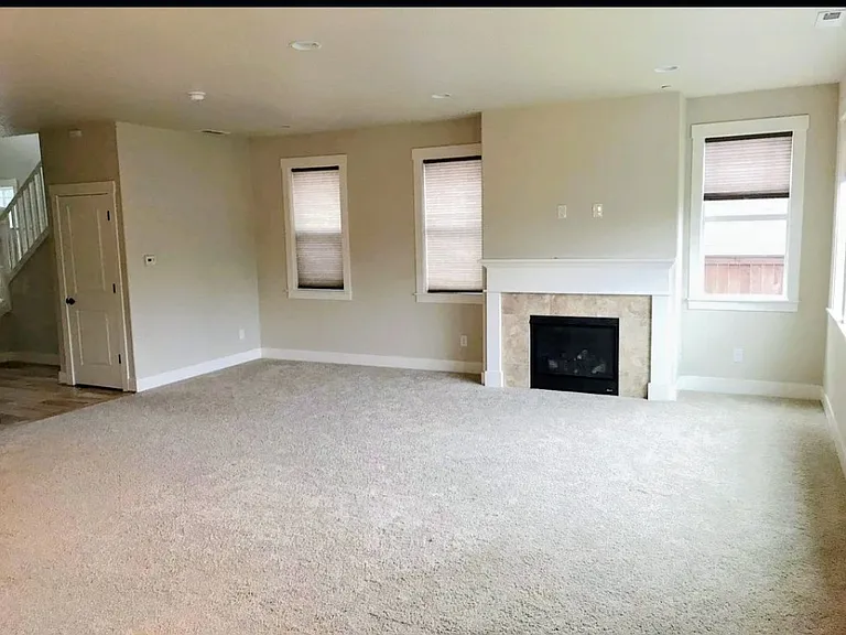 Massive living area with windows all around for light and ventilation.