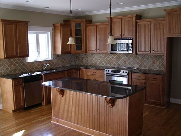 Granite, Tile Backsplash, SS Appliances