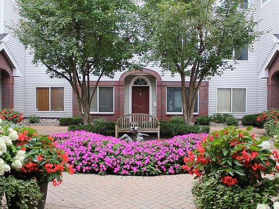 This stunning courtyard view will greet guests as they arrive.  Entrance to this unit is on the left.
