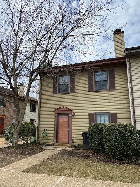 The exterior siding will be changed to a lighter color with gray trim, shutters and door.