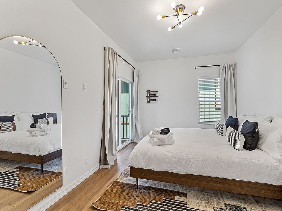 Primary bedroom with king bed + built in nightstands