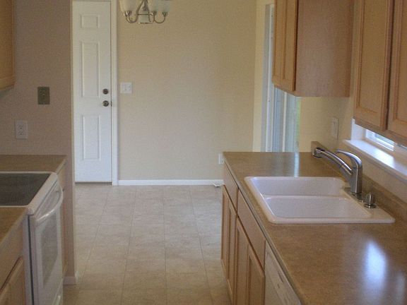 Kitchen and dining area. All new maple cabinets and kitchen applicances.