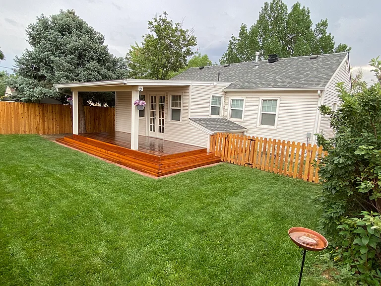 Small and peaceful back yard with separate dog yard.
