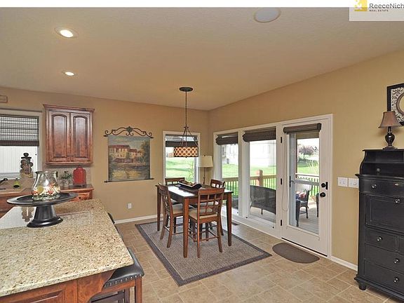 Dining area with views of the impeccably maintained backyard