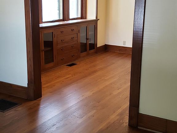 View to dining room with built in cabinetry