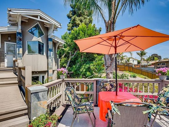 Back of home with view deck